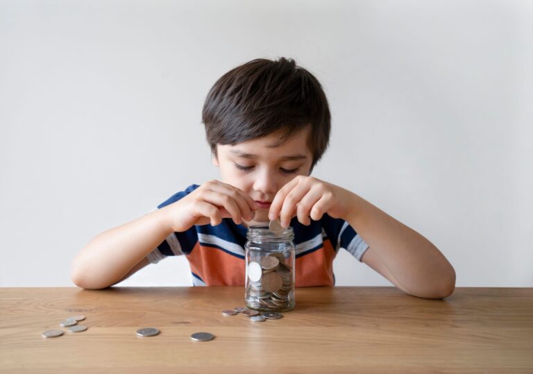 young boy counting money