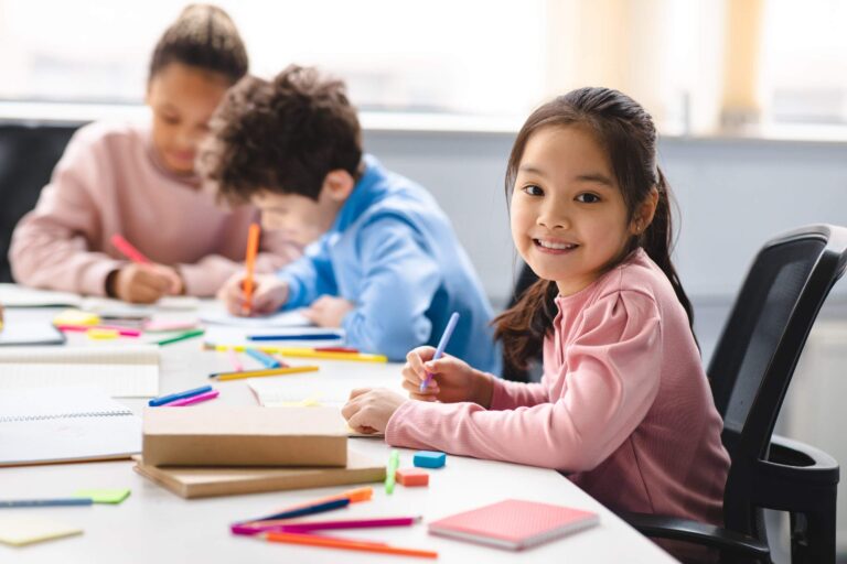 girl drawing at school