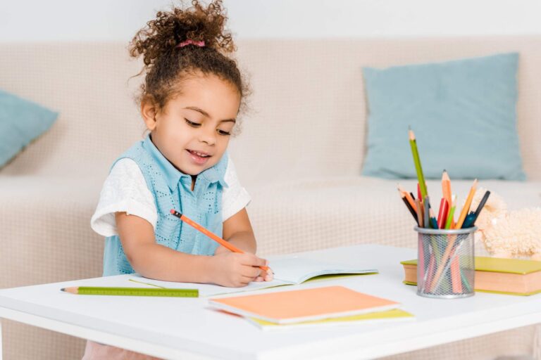 girl writing on paper