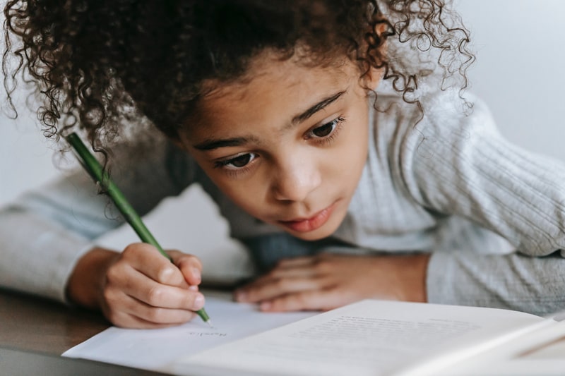 girl working on homework