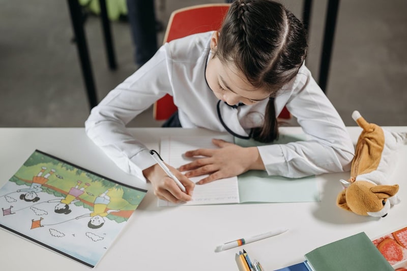 girl working on homework