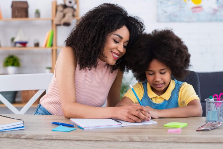 mom helping child with homework