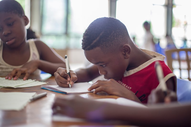 young boy studying