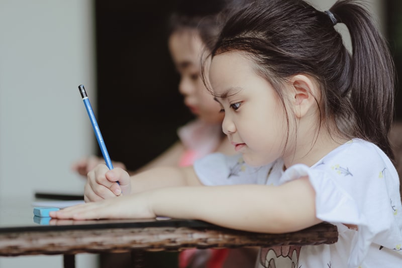 young girl drawing