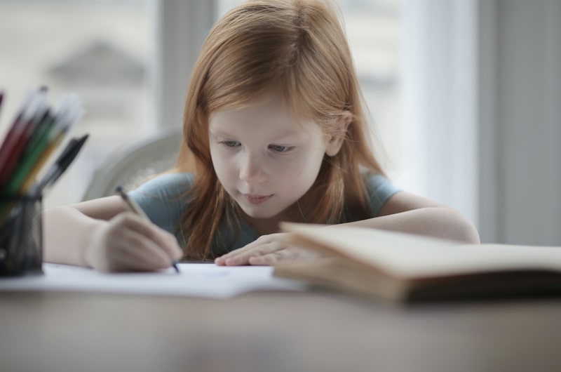 girl doing homework