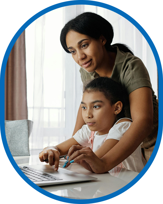 Parent or Guardian with student using laptop