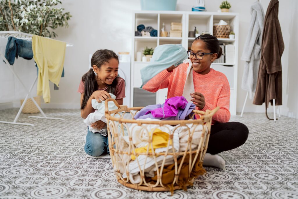 children doing laundry